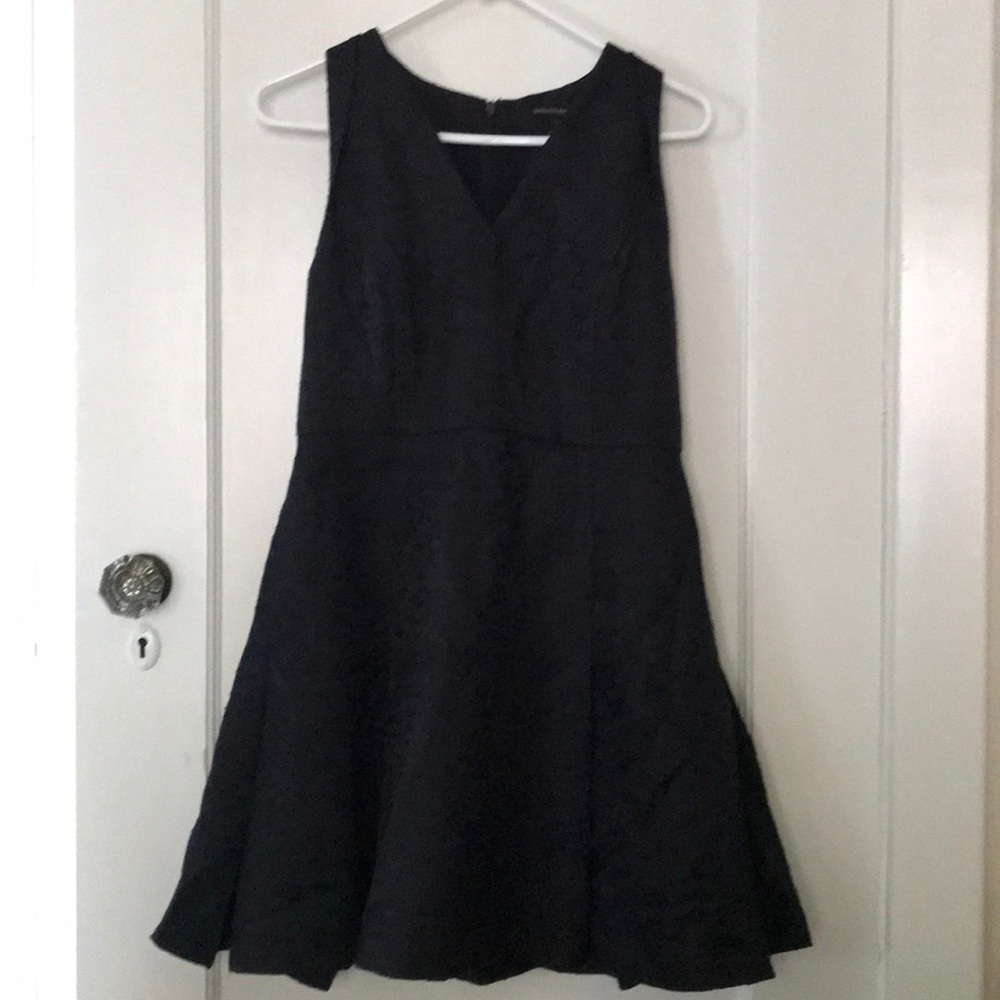 Navy v neck, pleated dress